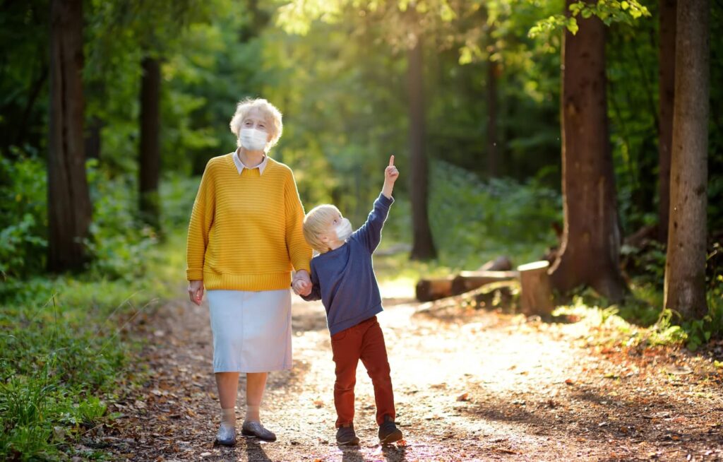 grandmother walking with her grandson