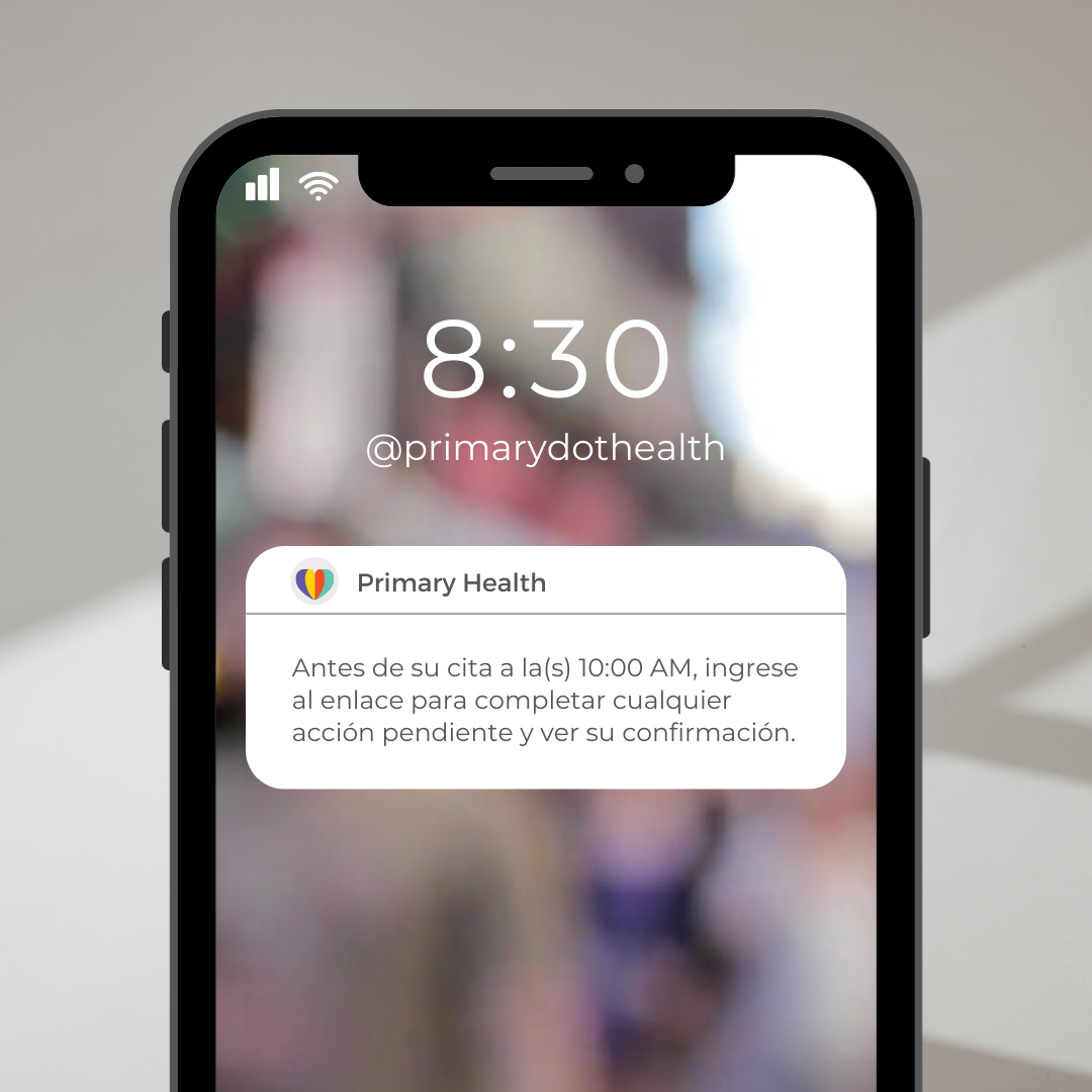 Phone showing example of Spanish reminder notification from Primary